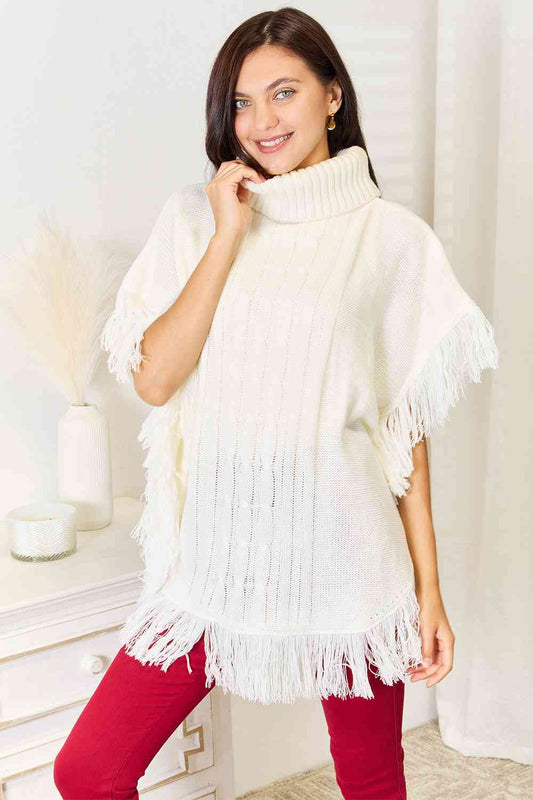 Turtle Neck Fringe Poncho in Ivory